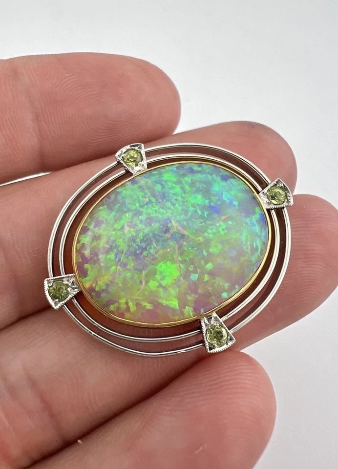 ANTIQUE ART DECO PLATINUM & 18K YELLOW GOLD AUSTRALIAN FIRE OPAL PIN BROOCH: ANTIQUE ART DECO PLATINUM & 18K YELLOW GOLD AUSTRALIAN FIRE OPAL PIN BROOCH Antique Art Deco Platinum & 18k Yellow Gold Australian Fire Opal Pin Brooch Size: Over 1 1/4" Wide by 1 1/8" Tall Weight is 