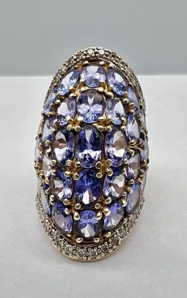 DESIGNER 14K YELLOW GOLD 15.00TCW APPROX. TANZANITE & DIAMOND WIDE BAND RING 15G: Designer 14k Yellow Gold 15.00tcw Approx. Tanzanite & Diamond Wide Band Ring 15g Ring Size: 7.75 - Can Be Resized Metal: 14k Yellow Gold Weight is 15.0 Grams on my scale Amazing 15.00tcw Approx. Tanza