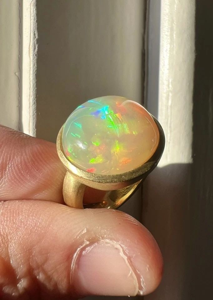 DESIGNER SATIN FINISH 18K YELLOW GOLD NATURAL AUSTRALIAN FIRE OPAL MODERN RING: DESIGNER SATIN FINISH 18K YELLOW GOLD NATURAL AUSTRALIAN FIRE OPAL MODERN RING Designer Satin Finish 18k Yellow Gold Natural Australian Fire Opal Modern Ring Ring Size: 5.5 - Can be Resized Weight is 