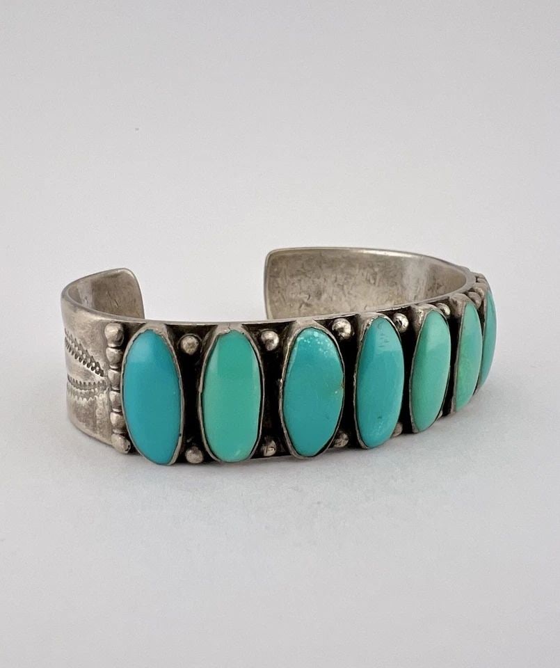 1940'S NAVAJO COIN SILVER INGOT CERRILLOS TURQUOISE STAMPED CUFF BRACELET 41.8G: OLD 1940's Navajo Coin Silver INGOT Cerrillos Turquoise Stamped Cuff Bracelet 41.8g Cuff is Just Over 5 1/4" tip to Tip and has a 1" Wide Gap Cuff Is 5/8" Wide In the Center Weight is 41.8 Grams on my