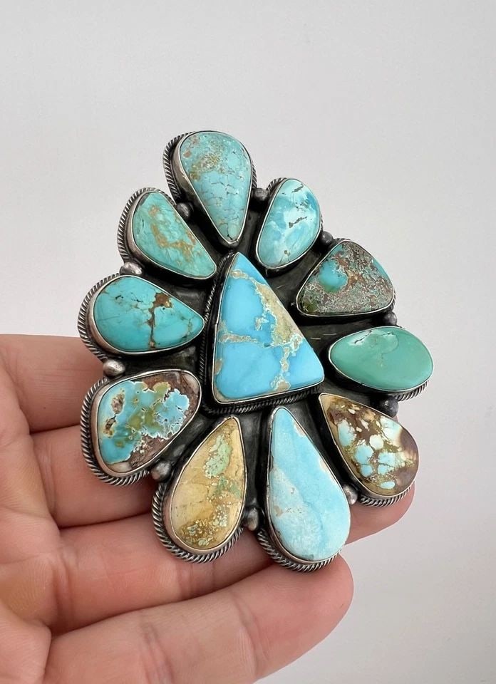 HUGE 86G DARREN LIVINGSTON NAVAJO STERLING SILVER HIGH GRADE TURQUOISE RING: MASSIVE 86g DARREN LIVINGSTON Navajo Sterling Silver High Grade Turquoise Ring Ring Size: 9 - Adjustable In Size Weight is 86.0 Grams on my scale Metal: Sterling Silver Face of The Ring is 3 5/8" Tall