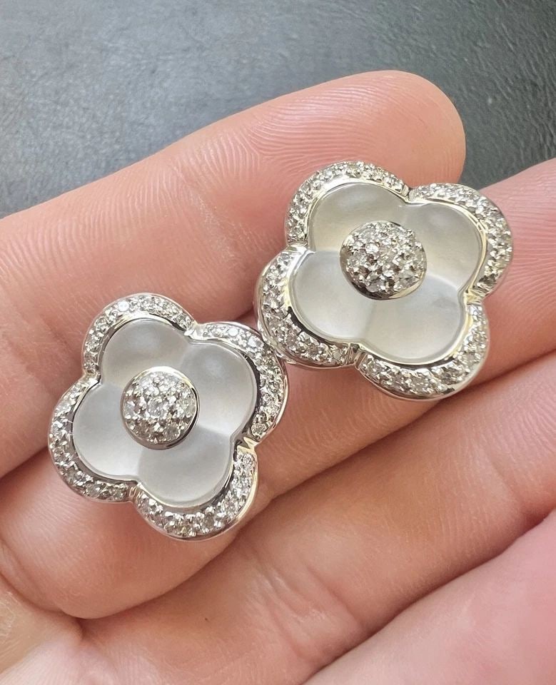 DESIGNER 18K WHITE GOLD ROCK QUARTZ DIAMOND FLOWER OMEGA BACK EARRINGS: DESIGNER 18K WHITE GOLD ROCK QUARTZ DIAMOND FLOWER OMEGA BACK EARRINGS Designer 18k White Gold Rock Quartz Diamond Flower Omega Back Earrings Size: 20mm Tall By 21mm Wide (7/8" x 7/8") Metal: 18k Whit