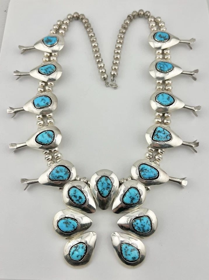 NAVAJO STERLING SLEEPING BEAUTY TURQUOISE SHADOWBOX SQUASH BLOSSOM NECKLACE 25": NAVAJO STERLING SLEEPING BEAUTY TURQUOISE SHADOWBOX SQUASH BLOSSOM NECKLACE 25" Vintage Navajo Sterling Silver Sleeping Beauty Turquoise Shadowbox Squash Blossom Necklace 25" This Amazing necklace fea