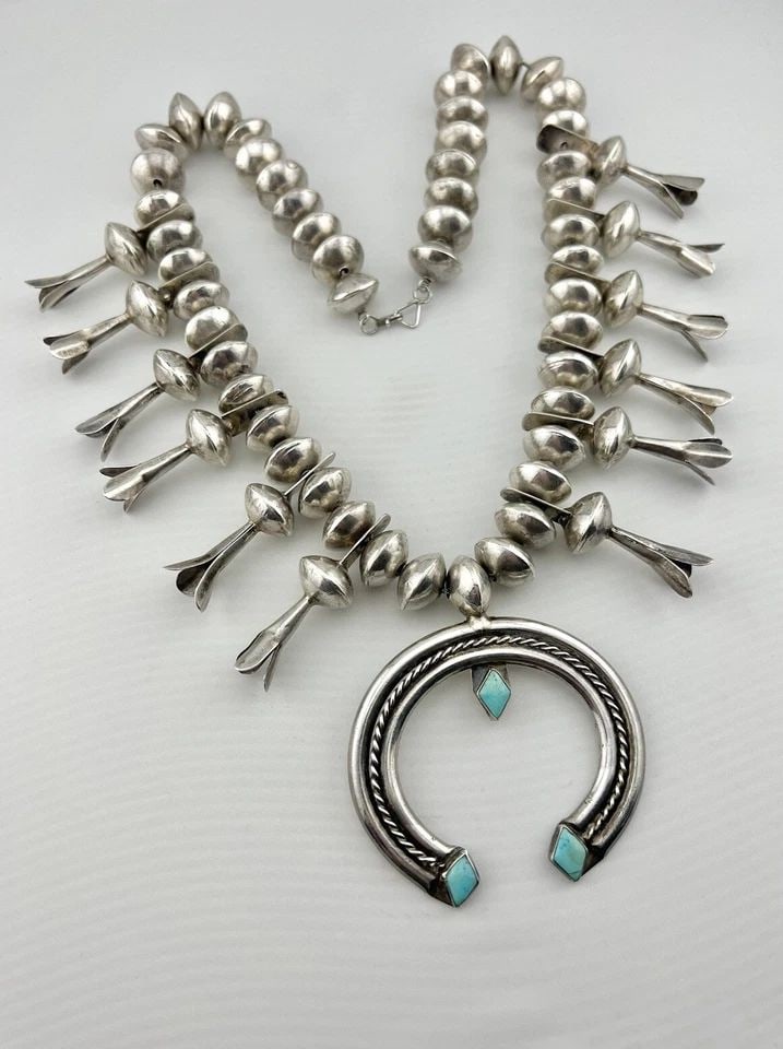 EARLY HAND TOOLED NAVAJO STERLING SILVER TURQUOISE SQUASH BLOSSOM NECKLACE 214G: EARLY HAND TOOLED NAVAJO STERLING SILVER TURQUOISE SQUASH BLOSSOM NECKLACE 214G EARLY HAND TOOLED NAVAJO STERLING SILVER TURQUOISE SQUASH BLOSSOM NECKLACE 214g This Amazing necklace features Gem Quali