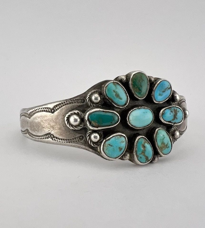1940S NAVAJO COIN SILVER INGOT NATURAL CERRILLOS TURQUOISE STAMPED CUFF BRACELET: Early 1940s Navajo Coin Silver INGOT Natural Cerrillos Turquoise Stamped Cuff Bracelet Cuff is Around 5 1/2" tip to Tip and has an 1 1/4" Wide Slightly Adjustable Gap Cuff Is 1 1/8" Wide In the Center