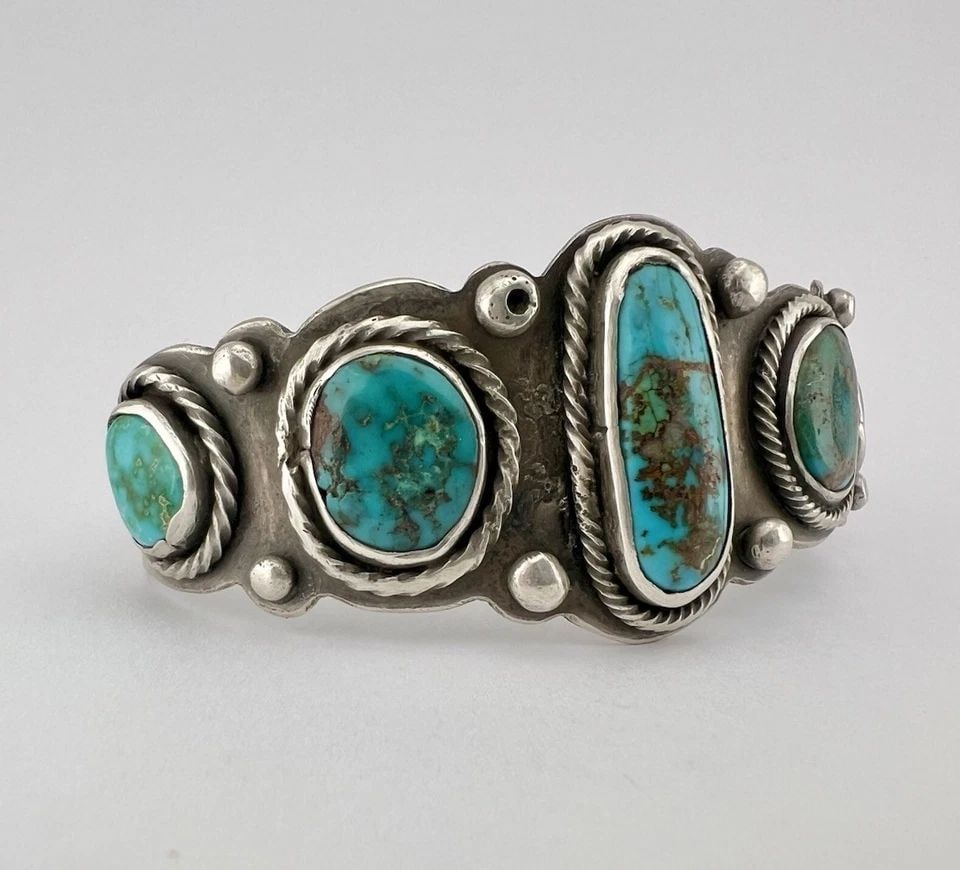 1940S NAVAJO COIN SILVER INGOT NATURAL CERRILLOS TURQUOISE STAMPED CUFF BRACELET: Early Antique 1940's Navajo Coin Silver Ingot Natural Cerrillos Turquoise Stamped Cuff Bracelet Cuff is Around 5 5/8" tip to Tip and has an Just Under 1 1/4" Wide Slightly Adjustable Gap Cuff Is 1 1/4