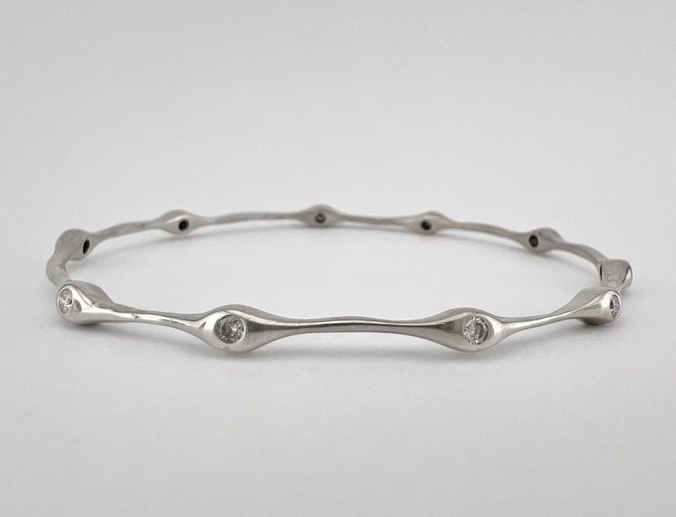 SONIA BITTON 14K WHITE GOLD MODERNIST ETERNITY DIAMOND STATION BANGLE BRACELET: SONIA BITTON 14K WHITE GOLD MODERNIST ETERNITY DIAMOND STATION BANGLE BRACELET SONIA BITTON 14K White Gold Modernist Eternity Diamond Station Bangle BraceletWeight 8.5 grams on my Sclae Size small, wi