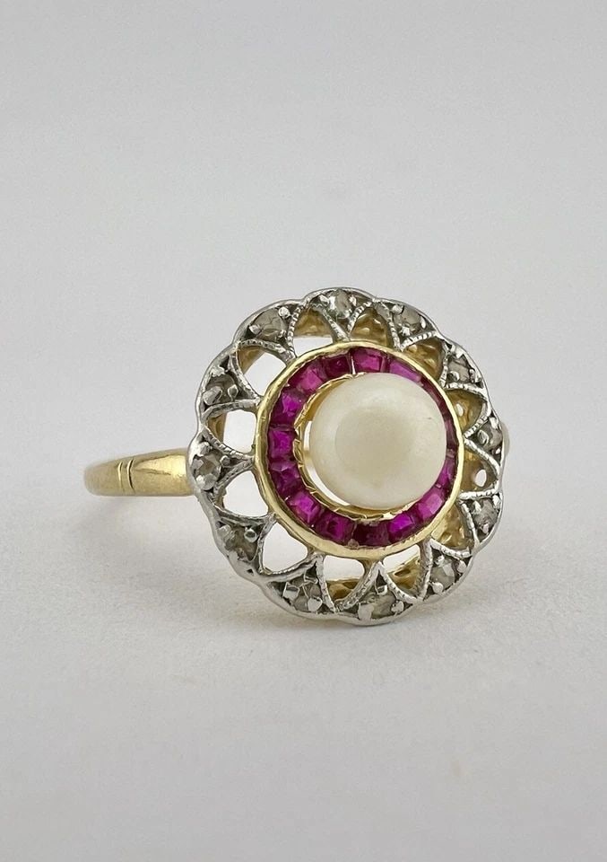 ANTIQUE VICTORIAN 18K GOLD PLATINUM PEARL & RUBY & OLD CUT DIAMOND HALO RING: ANTIQUE VICTORIAN 18K GOLD PLATINUM PEARL & RUBY & OLD CUT DIAMOND HALO RING Antique Victorian 18K Gold Platinum Pearl & Ruby & Old Cut Diamond Halo Ring Size: 6.5 - Can Be Resized Weight is 2.6 Grams