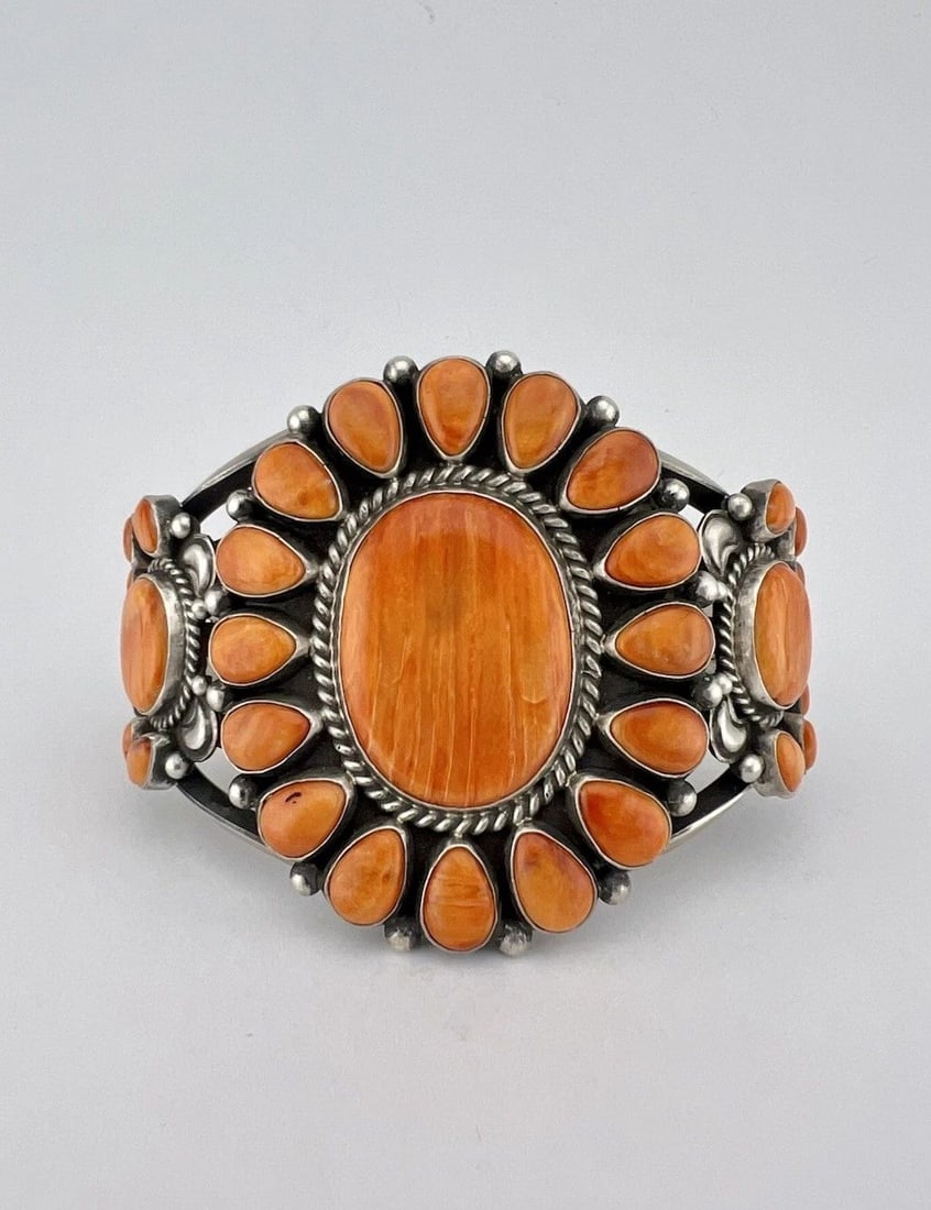TYLER BROWN NAVAJO STERLING SILVER SPINY OYSTER CLUSTER CUFF BRACELET 95.5G: HUGE Tyler Brown Navajo Sterling Silver Orange Spiny Oyster Shell Cluster Cuff Bracelet 95.5g Cuff is 5 1/2" tip to Tip and has a 1 1/4" Wide Slightly Adjustable Gap Cuff Is 2 3/8" Wide In the Center 