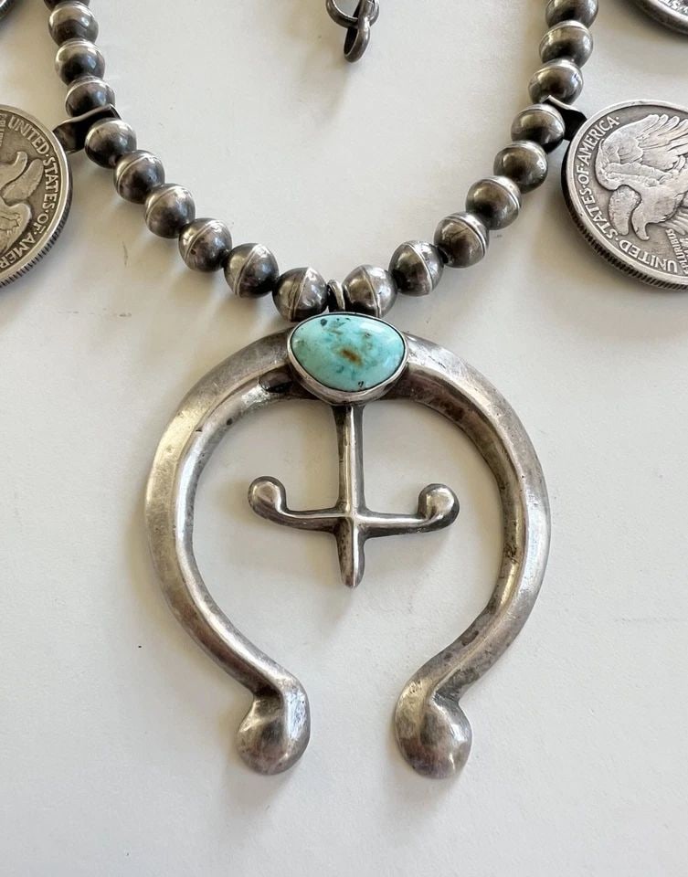 VTG NAVAJO SILVER WALKING LIBERTY HALF DOLLAR TURQUOISE SQUASH BLOSSOM NECKLACE: VTG NAVAJO SILVER WALKING LIBERTY HALF DOLLAR TURQUOISE SQUASH BLOSSOM NECKLACE Vtg Navajo Silver Walking Liberty Half Dollar Turquoise Squash Blossom Necklace This Amazing necklace features huge spec