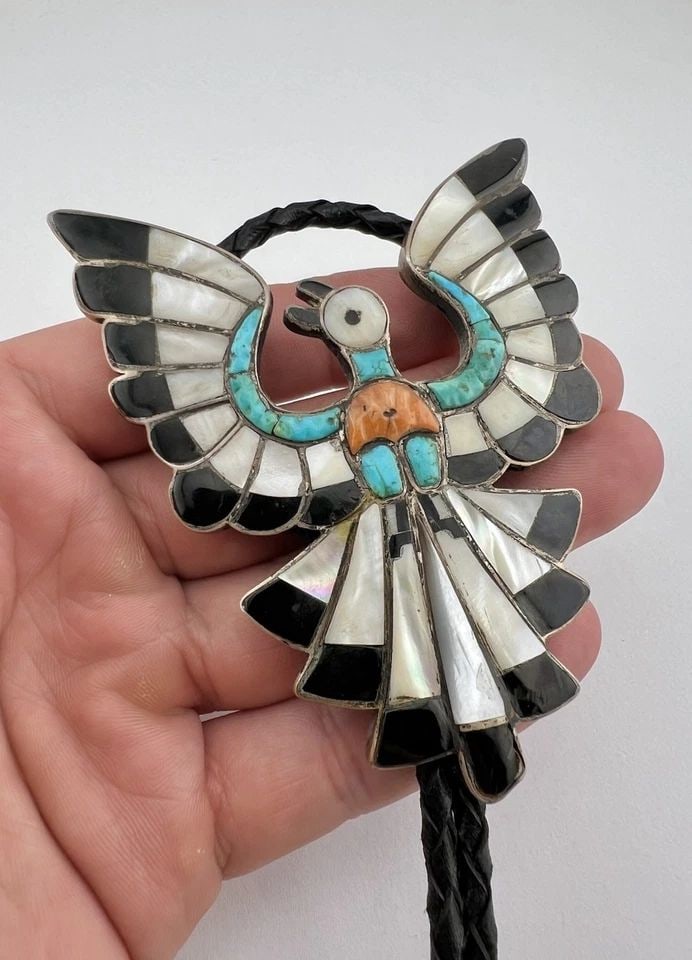 OLD ZUNI DIXON SHEBALA STERLING SILVER THUNDERBIRD FLUSH INLAY BOLO TIE 3 5/8": OLD Zuni Dixon Shebala Sterling Silver Thunderbird Flush Inlay Bolo Tie 3 5/8" Size: 3 5/8" Tall by 3" Wide At The Top Weight is 61.9 Grams on my scale Metal: Sterling Silver Amazing Natural Turquoise