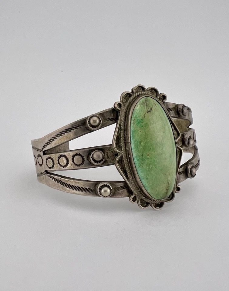 OLD 1940'S NAVAJO INGOT COIN SILVER CERRILLOS TURQUOISE STAMPED CUFF BRACELET: OLD 1940'S NAVAJO INGOT COIN SILVER CERRILLOS TURQUOISE STAMPED CUFF BRACELET OLD 1940's Navajo INGOT Coin Silver Cerrillos Turquoise Stamped Cuff Bracelet Cuff is 5 3/4" tip to Tip and has a 1" Wide 