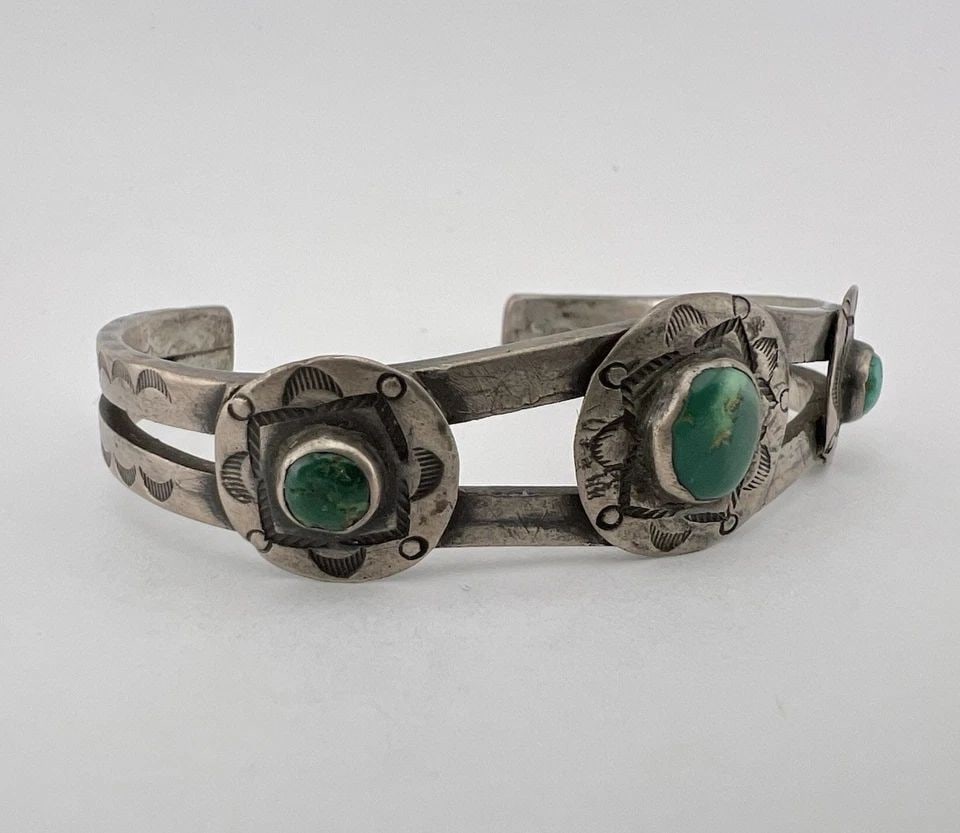 1930'S PAWN NAVAJO COIN SILVER INGOT CERRILLOS TURQUOISE STAMPED CUFF BRACELET: Early Old Pawn 1930's Navajo Coin Silver INGOT Cerrillos Turquoise Stamped Cuff Bracelet Cuff is 5 3/8" tip to Tip and has a 1 1/4" Wide Gap Cuff Is 3/4" Wide In the Center Weight is 27.8 Grams on my 