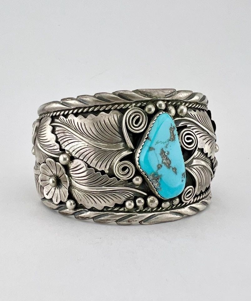 VTG NAVAJO STERLING SILVER SLEEPING BEAUTY TURQUOISE STAMPED CUFF BRACELET 101G: MASSIVE Vtg Navajo Sterling Silver Sleeping Beauty Turquoise Stamped Cuff Bracelet 101g Cuff is 5 3/4" tip to Tip and has a 1 1/4" Wide Adjustable Gap Cuff Is 1 3/4" Wide In the Center Weight is 101.0