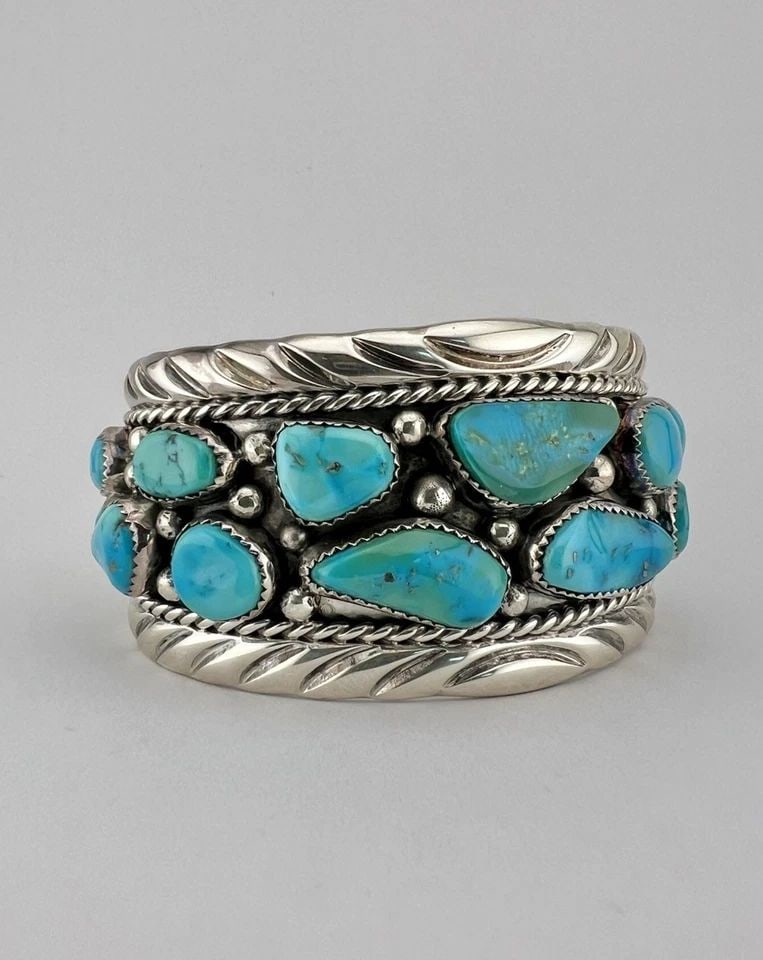 HUGE VTG NAVAJO STERLING SILVER ROYSTON TURQUOISE STAMPED CUFF BRACELET 102G: HUGE Vtg Navajo Sterling Silver Royston Turquoise Stamped Cuff Bracelet 102g Cuff is A Tad Over 6" tip to Tip and has a 1 1/4" Wide - Slightly Adjustable Gap Cuff Is Over 1 1/2" Wide In the Center Wei