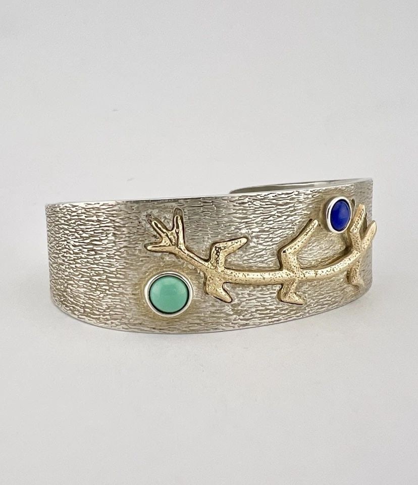 ANDREW REDHORSE ALVAREZ NAVAJO STERLING SILVER & 14K CORNSTALK CUFF BRACELET: RARE Andrew Redhorse Alvarez Navajo Sandcast Sterling Silver & 14k Gold Cornstalk Cuff Bracelet Cuff is 5 1/2" tip to Tip and has a 1 1/4" Wide Gap Cuff Is 7/8" Wide In the Center Weight is 60.5 Grams