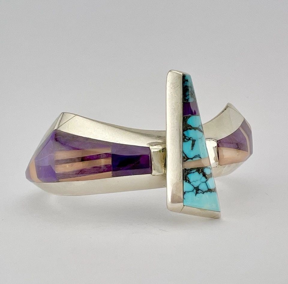 LARRY CASTILLO NAVAJO TURQUOISE & CORAL & SUGILITE STERLING SILVER CUFF BRACELET: LARRY CASTILLO NAVAJO TURQUOISE & CORAL & SUGILITE STERLING SILVER CUFF BRACELET Larry Castillo Navajo Turquoise & Coral & Sugilite Sterling Silver Cuff Bracelet Bracelet is 5" Tip to Tip With A 1 1/4