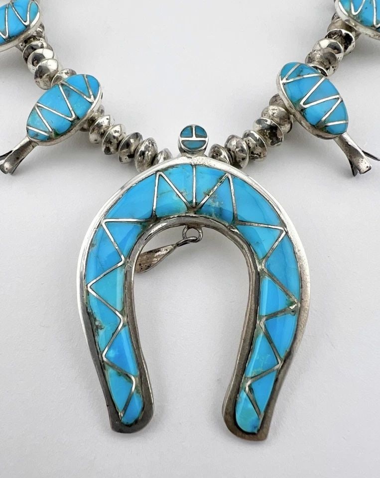 VTG NAVAJO STERLING SILVER FLUSH TURQUOISE SQUASH BLOSSOM NECKLACE EARRINGS SET: VTG NAVAJO STERLING SILVER FLUSH TURQUOISE SQUASH BLOSSOM NECKLACE EARRINGS SET Vtg Navajo Sterling Silver Flush Turquoise Squash Blossom Necklace & Earrings Set This Amazing necklace features huge sp