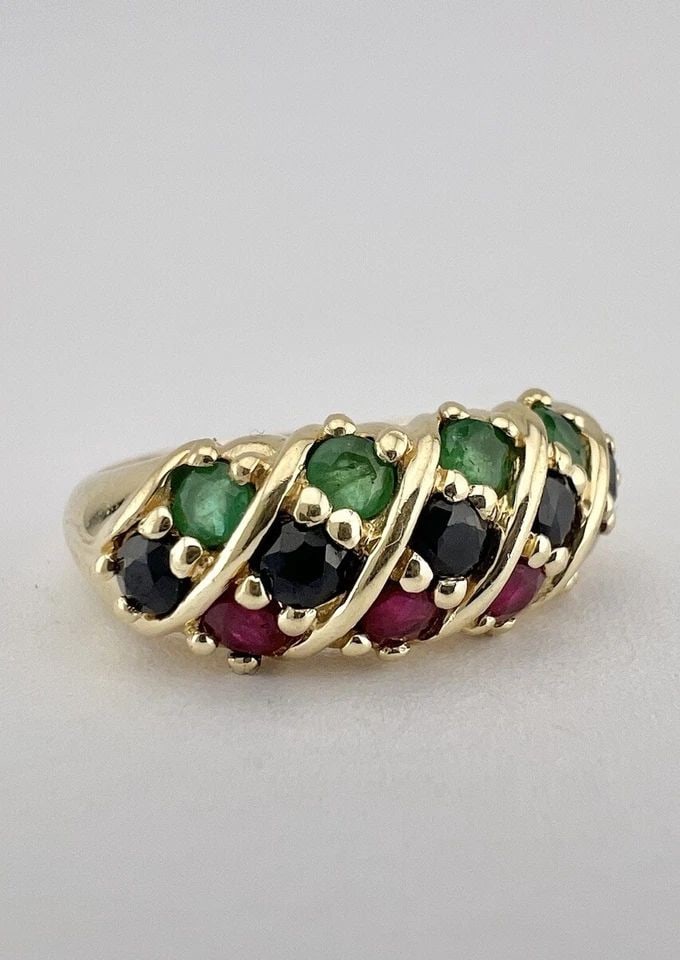 DESIGNER 14K YELLOW GOLD EMERALD & SAPPHIRE & RUBY CRISSCROSS RING: DESIGNER 14K YELLOW GOLD EMERALD & SAPPHIRE & RUBY CRISSCROSS RING Designer 14k Yellow Gold Emerald & Sapphire & Ruby Crisscross Ring Size: 8 - Can be Resized With Out Damage Weight is 5.1 Grams on my