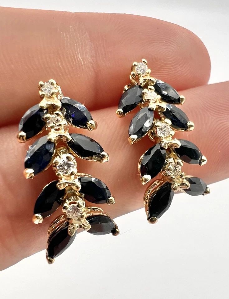 DESIGNER 14K YELLOW GOLD NATURAL 5.60CT BLUE SAPPHIRE & .25CT DIAMOND EARRINGS: DESIGNER 14K YELLOW GOLD NATURAL 5.60CT BLUE SAPPHIRE & .25CT DIAMOND EARRINGS Designer 14k Yellow Gold Natural 5.60ct Blue Sapphire & .25ct Diamond Earrings Size: Just Under 1" Tall By Just Under 1/2