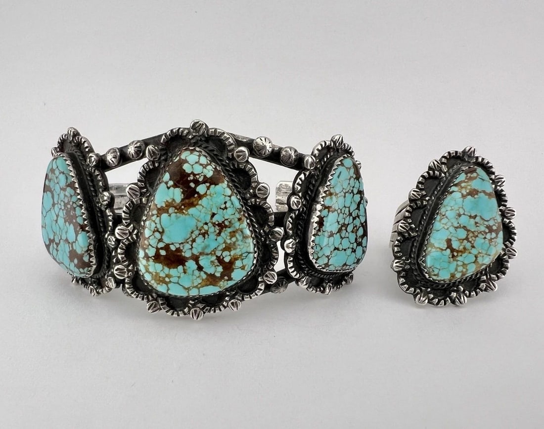 VTG NAVAJO STERLING SILVER NATURAL SPIDERWEB #8 TURQUOISE CUFF BRACELET RING SET: Vtg Navajo Sterling Silver Natural Spiderweb #8 Turquoise Cuff Bracelet & Ring SET Cuff is 5 5/8" tip to Tip and has a 1 1/4" Wide Adjustable Gap Cuff Is 1 5/8" Wide In the Center Cuffs Weight is 75.0