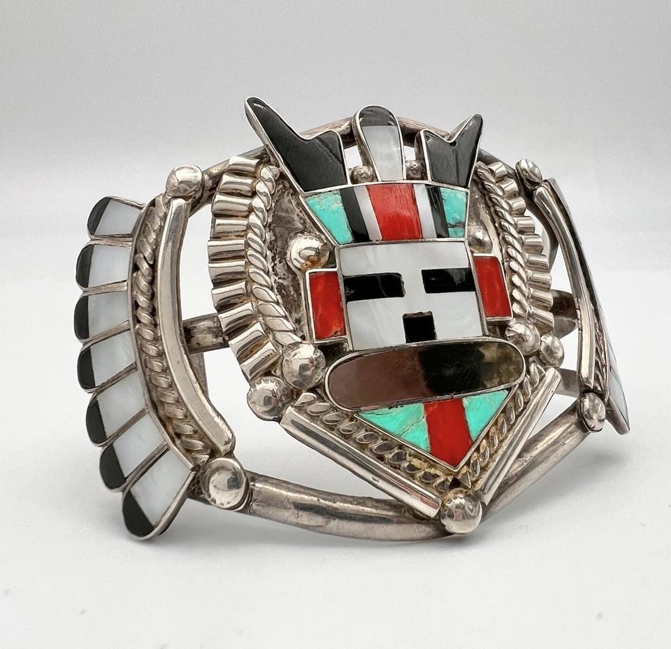 VINTAGE ZUNI ANTELOPE KACHINA MULTI GEMSTONE INLAY SIGNED BRACELET - 57.7G: VINTAGE ZUNI ANTELOPE KACHINA MULTI GEMSTONE INLAY SIGNED BRACELET - 57.7G Vintage Zuni Antelope Kachina Multi Gemstone Inlay Signed Bracelet - 57.7g Cuff is 5" tip to Tip and has a 1 1/4" Adjustable 
