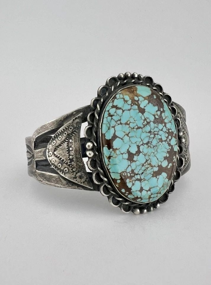 VTG NAVAJO STERLING SILVER NATURAL SPIDERWEB #8 TURQUOISE STAMPED CUFF BRACELET: VTG NAVAJO STERLING SILVER NATURAL SPIDERWEB #8 TURQUOISE STAMPED CUFF BRACELET Vtg Navajo Sterling Silver Natural Spiderweb #8 Turquoise Stamped Cuff Bracelet Cuff is 5 3/4" tip to Tip and has a Jus 