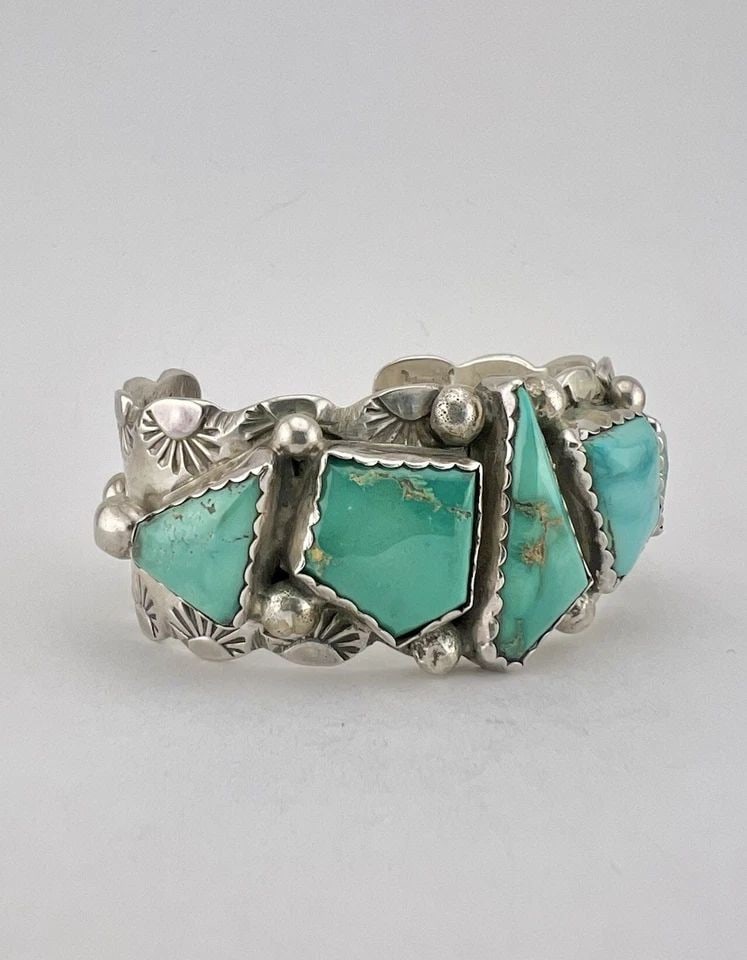VTG E & C FIERRO NAVAJO STERLING SILVER FOX TURQUOISE STAMPED CUFF BRACELET: Vtg E & C Fierro Navajo Sterling Silver Fox Turquoise Stamped Cuff Bracelet Cuff is A Tad Over 5" tip to Tip and has a 1" Wide Adjustable Gap Cuff Is Over 1" Wide In the Center Weight is 66.7 Grams on