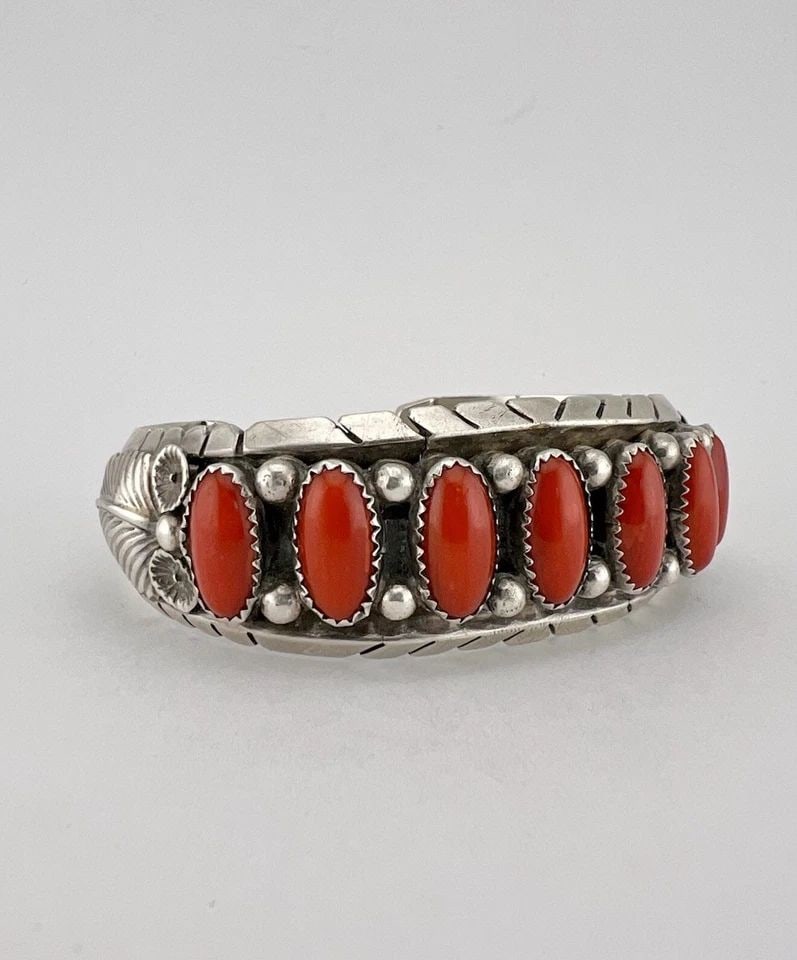 VTG M. BENNETT NAVAJO STERLING SILVER MEDITERRANEAN CORAL STAMPED CUFF BRACELET: Vtg M. Bennett Navajo Sterling Silver Mediterranean Coral Stamped Cuff Bracelet Cuff is 5 1/2" tip to Tip and has a Around 1" Wide - Slightly Adjustable Gap Cuff Is About 1" Wide Weight is 53.0 Grams 