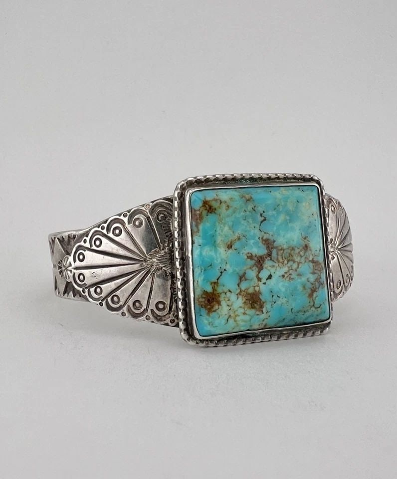 EARLY OLD NAVAJO COIN SILVER INGOT NEVADA TURQUOISE STAMPED CUFF BRACELET: EARLY OLD NAVAJO COIN SILVER INGOT NEVADA TURQUOISE STAMPED CUFF BRACELET Early OLD PAWN Navajo Coin Silver INGOT Nevada Turquoise Stamped Cuff Bracelet Cuff is 5 3/4" tip to Tip and has a 1 1/4" Wide