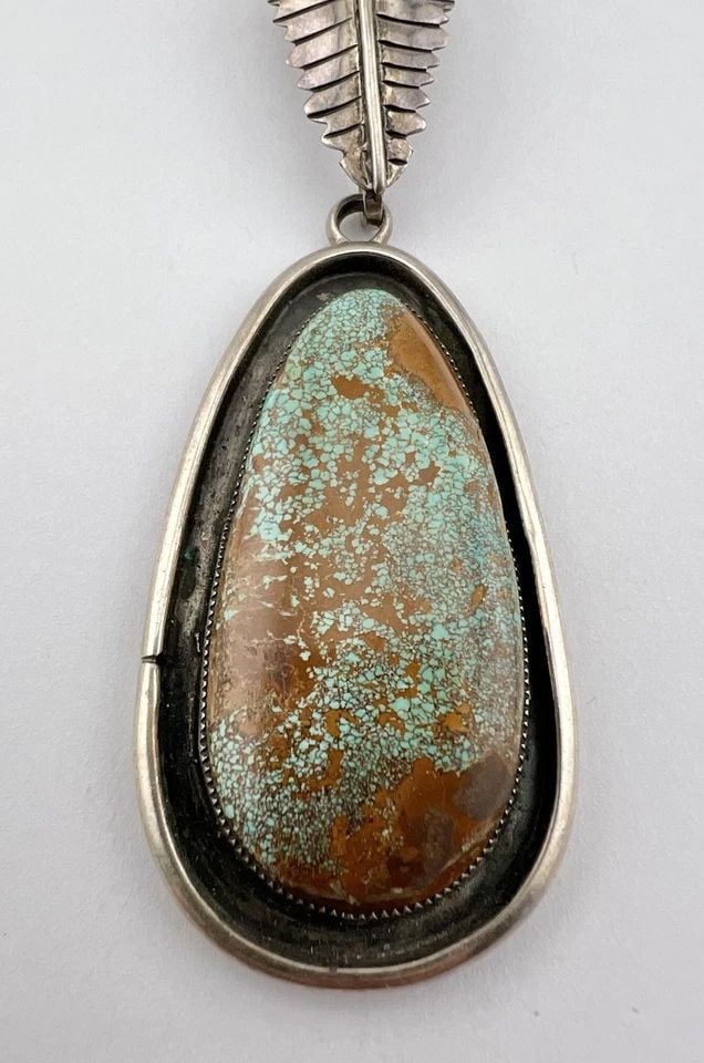 VTG NAVAJO STERLING SILVER ROYSTON TURQUOISE STAMPED BENCH BEAD NECKLACE PENDANT: Vtg EB Navajo Sterling Silver Royston Turquoise Stamped Bench Bead Necklace PendantMEASUREMENTS: Necklace measures 17" Tip To Tip Pendant W/ Leaf is 4 1/2" Tall With Dangle Royston Pendant itself is 2