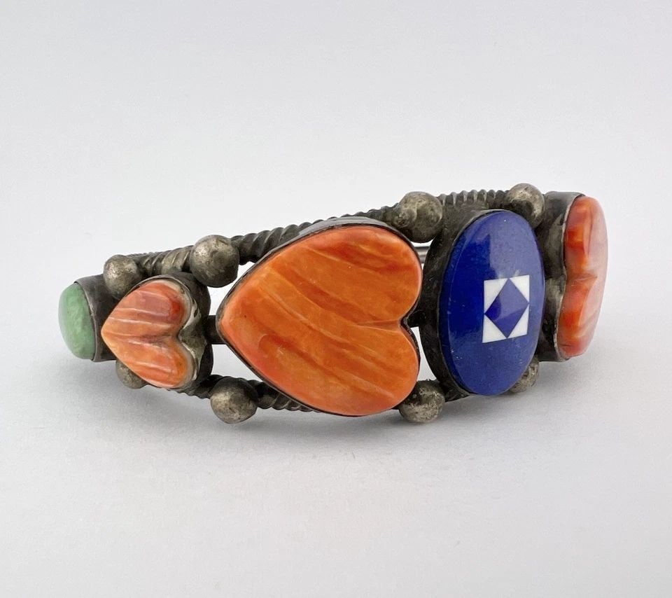 AUSTIN GARCIA NAVAJO STERLING TURQUOISE SPINY OYSTER & LAPIS HEART CUFF BRACELET: AUSTIN GARCIA NAVAJO STERLING TURQUOISE SPINY OYSTER & LAPIS HEART CUFF BRACELET Austin Garcia Navajo Sterling Turquoise Spiny Oyster & Lapis Heart Cuff Bracelet Cuff is 5" tip to Tip and has a Just U