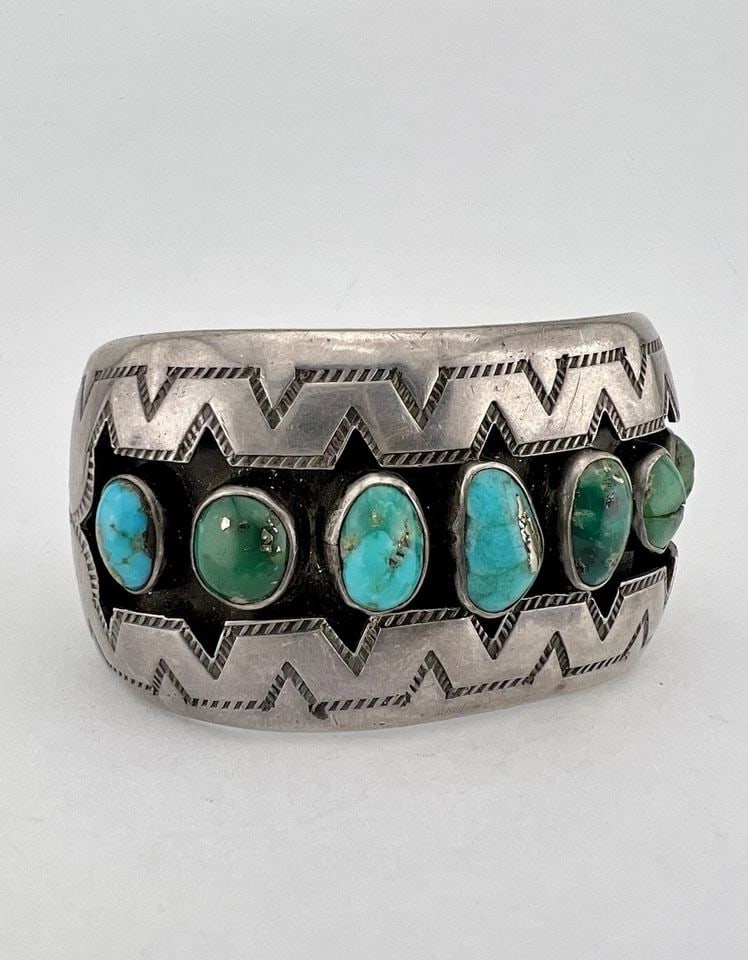 EARLY FRED HARVEY NAVAJO COIN SILVER CERRILLOS TURQUOISE SHADOWBOX CUFF BRACELET: EARLY FRED HARVEY NAVAJO COIN SILVER CERRILLOS TURQUOISE SHADOWBOX CUFF BRACELET Early Fred Harvey Navajo Coin Silver Cerrillos Turquoise Shadowbox Cuff Bracelet Cuff is 5 1/4" tip to Tip and has a 1 