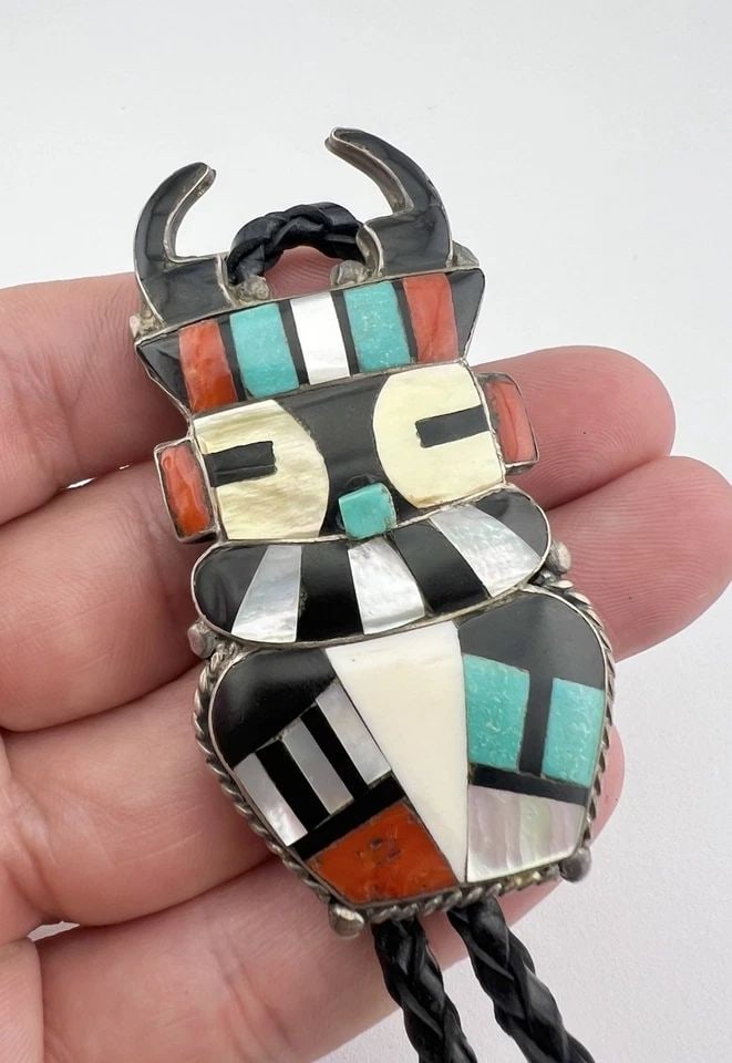 EARLY ANTHONY & RITA EDAAKIE ZUNI STERLING SILVER ANTELOPE KACHINA BOLO TIE: EARLY ANTHONY & RITA EDAAKIE ZUNI STERLING SILVER ANTELOPE KACHINA BOLO TIE Early Anthony & Rita Edaakie Zuni Sterling Silver Antelope Kachina Bolo Tie Size: Around 2 3/4" Tall by 1 3/8" Wide Weight i