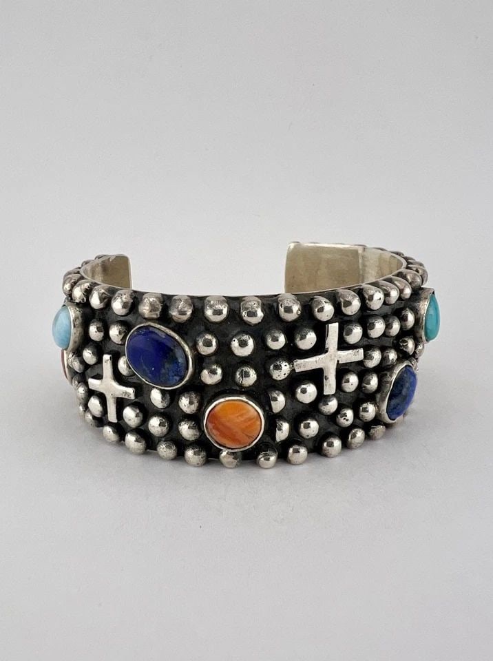 VINTAGE NAVAJO STERLING SILVER MULTI GEMSTONE CROSS / DOT CUFF BRACELET 94.6G: VINTAGE NAVAJO STERLING SILVER MULTI GEMSTONE CROSS / DOT CUFF BRACELET 94.6G MASSIVE Vintage Navajo Sterling Silver Multi Gemstone Cross / Dot Cuff Bracelet 94.6g Cuff is 5" tip to Tip and has a 1 3/