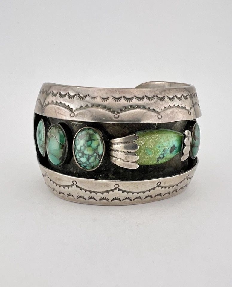 NAVAJO STERLING SILVER DAMELE TURQUOISE STAMPED SHADOWBOX CUFF BRACELET 90.8G: HUGE Navajo Sterling Silver Damele Turquoise Stamped Shadowbox Cuff Bracelet 90.8g Cuff is Tad Over 5" tip to Tip and has a 1 1/4" Wide Gap Cuff Is 1 5/8" Wide In the Center Weight is 90.8 Grams on my