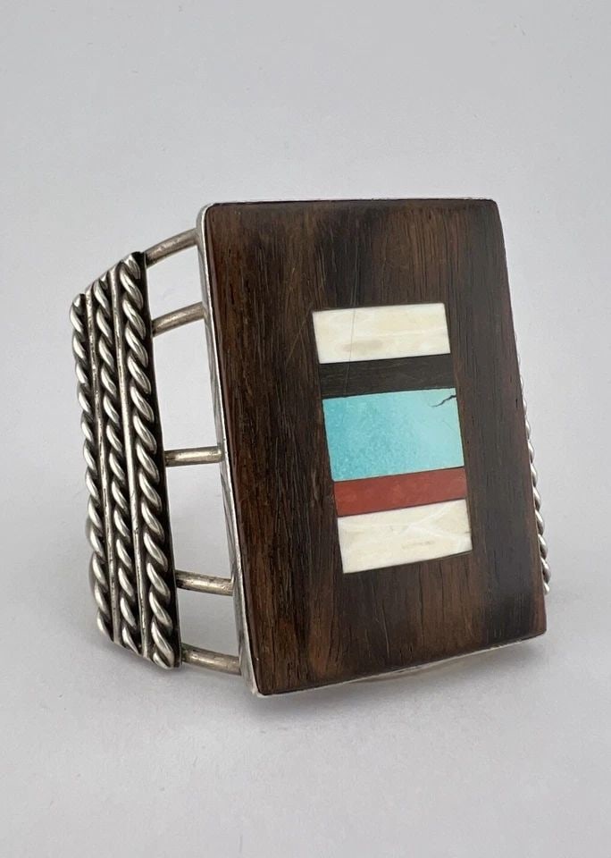 VTG NAVAJO STERLING SILVER WOOD TURQUOISE CORAL FLUSH INLAY WIDE CUFF BRACELET: VTG NAVAJO STERLING SILVER WOOD TURQUOISE CORAL FLUSH INLAY WIDE CUFF BRACELET Vtg Navajo Sterling Silver Wood Turquoise Coral Flush Inlay WIDE Cuff Bracelet Cuff is 5 3/8" tip to Tip and has a 1 1/4"