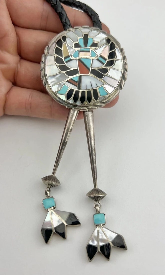 RALPH & LILLIE KALLESTEWA ZUNI STERLING SILVER MULTI GEMSTONE KNIFEWING BOLO TIE: Ralph & Lillie Kallestewa Zuni Sterling Silver Multi Gemstone Knifewing Bolo Tie Size: 2 1/8" Tall by 2 1/8" Wide Weight is 66.3 Grams on my scale Metal: Sterling Silver Amazing Natural Turquoise & Co