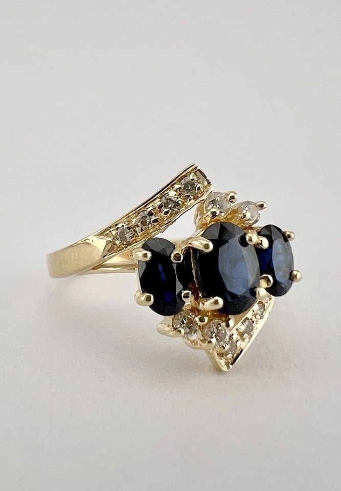 DESIGNER 14K YELLOW GOLD OVAL CUT BLUE SAPPHIRE & DIAMOND BYPASS RING (1 of 2)