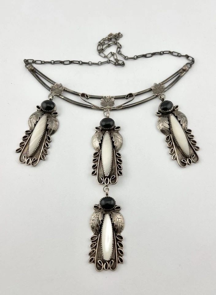 VTG NAVAJO STERLING SILVER MOTHER OF PEARL & ONYX STAMPED DANGLE COLLAR NECKLACE: Vtg Navajo Sterling Silver Mother of Pearl & Onyx Stamped Dangle Collar Necklace MEASUREMENTS: Necklace measures 16" Tip To Tip Center Dangle Pendant is 4 3/4" Tall With Dangle by Just Under 1" Wide W