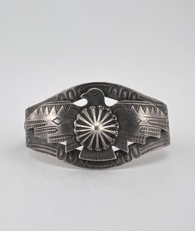 OLD FRED HARVEY ERA NAVAJO STERLING SILVER STAMPED THUNDERBIRD CUFF BRACELET: OLD FRED HARVEY ERA NAVAJO STERLING SILVER STAMPED THUNDERBIRD CUFF BRACELET OLD Fred Harvey Era Navajo Sterling Silver Stamped Thunderbird Cuff Bracelet Cuff is Almost 5 3/4" tip to Tip and has a 1 1