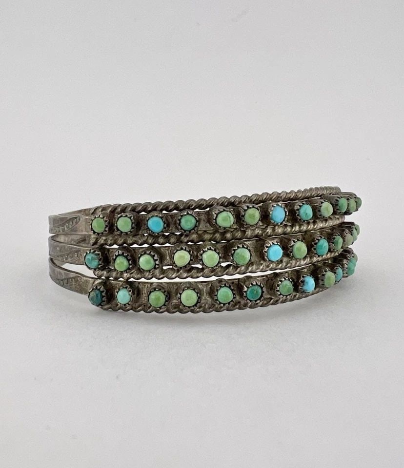 OLD 1940'S ZUNI STERLING SILVER TURQUOISE 3 ROW SNAKE EYE STAMPED CUFF BRACELET: OLD 1940'S ZUNI STERLING SILVER TURQUOISE 3 ROW SNAKE EYE STAMPED CUFF BRACELET OLD 1940's Zuni Sterling Silver Turquoise 3 Row Snake Eye Stamped Cuff Bracelet Cuff is 5" tip to Tip and has a 1" Wide 