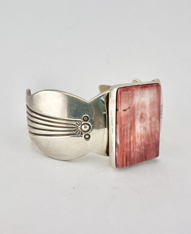 CHARLIE BOWIE NAVAJO STERLING SILVER RED/PURPLE SPINY OYSTER SHELL CUFF BRACELET: Charlie Bowie Navajo Sterling Silver Red/Purple Spiny Oyster Shell Cuff Bracelet Cuff is 5 3/8" tip to Tip and has a 1 1/8" Wide Adjustable Gap Cuff Is About 1 1/4" Wide In the Center Weight is 68.9 G