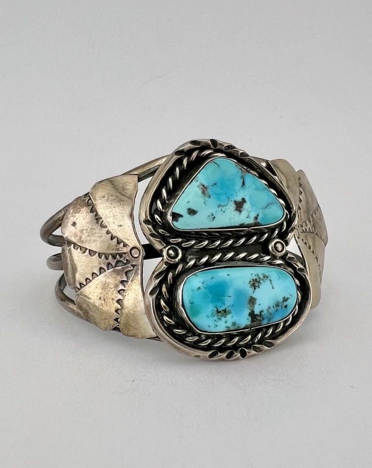VTG RS NAVAJO STERLING SILVER HIGH GRADE MORENCI TURQUOISE STAMPED CUFF BRACELET: Vtg RS Navajo Sterling Silver High Grade Morenci Turquoise Stamped Cuff Bracelet Cuff is 5 1/2" tip to Tip and has a 1 1/8" Wide Adjustable Gap Cuff Is 1 3/4" Wide In the Center Weight is 44.8 Grams o
