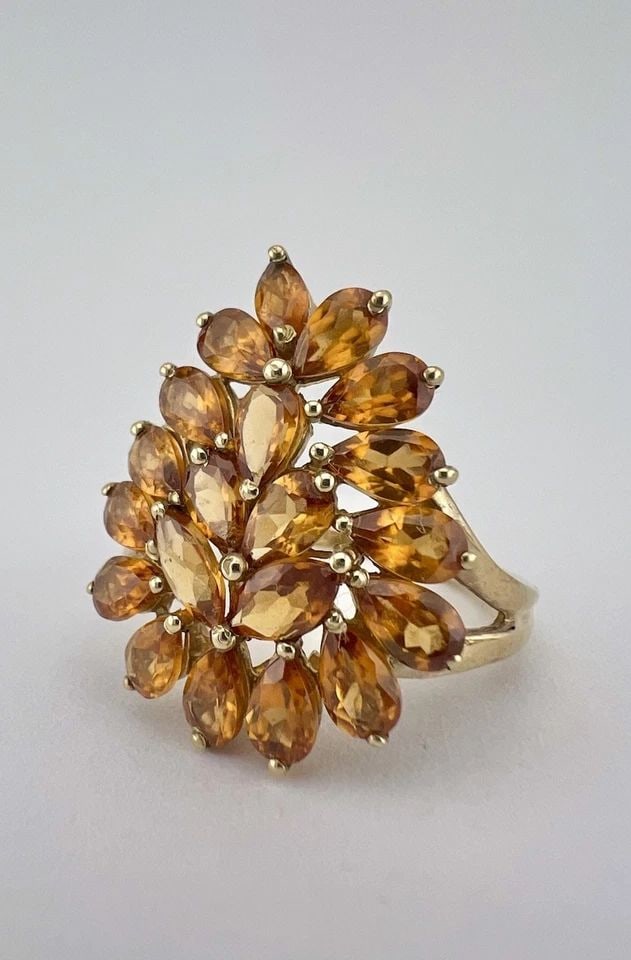 DESIGNER 10K YELLOW GOLD NATURAL IMPERIAL TOPAZ FLORAL CLUSTER RING: DESIGNER 10K YELLOW GOLD NATURAL IMPERIAL TOPAZ FLORAL CLUSTER RING Designer 10k Yellow Gold Natural Imperial Topaz Floral Cluster Ring Ring Size: 7.5 - Can Be Resized Metal: 10k Yellow Gold - Tested 