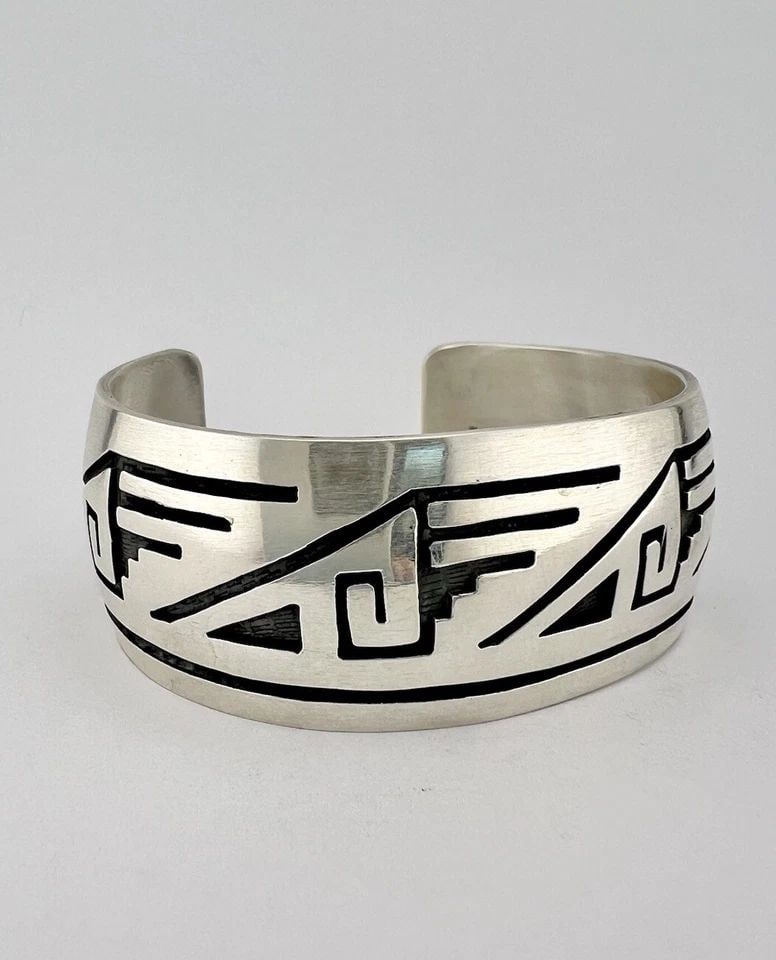 VTG HOPI STERLING SILVER TRIBAL DESIGN OVERLAY WIDE CUFF BRACELET 53.2G -SIGNED: VTG HOPI STERLING SILVER TRIBAL DESIGN OVERLAY WIDE CUFF BRACELET 53.2G -SIGNED Vtg HOPI Sterling Silver Tribal Design Overlay Wide Cuff Bracelet 53.2g -Signed Cuff is 5 1/4" tip to Tip and has a 1 1/
