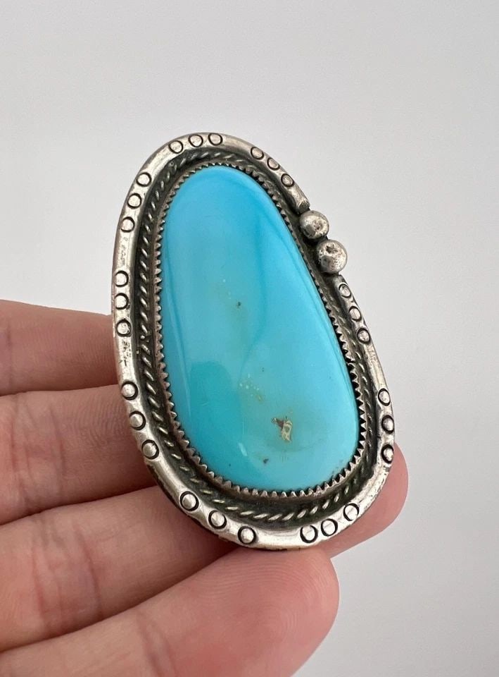 HUGE VTG NAVAJO STERLING SILVER HIGH GRADE ROYSTON TURQUOISE STAMPED RING 30.8G: HUGE Vtg Navajo Sterling Silver High Grade Royston Turquoise Stamped Ring 30.8g Ring Size: 12 - Can Be Re Sized Weight is 30.8 Grams on my scale Metal: Sterling Silver Ring is 2 3/8" Tall In the Cente