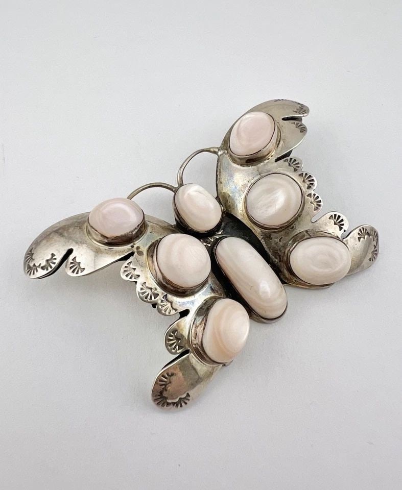 HUGE VTG NAVAJO STERLING SILVER MOTHER OF PEARL BUTTERFLY STAMPED PENDANT 3 3/8": HUGE Vtg Navajo Sterling Silver Mother of Pearl Butterfly Stamped Pendant 3 3/8" Size: Over 2" Tall & 3 3/8" Wide & 5/8" Deep Metal: Sterling Silver Weight is 42.5 Grams on my scale Amazing Natural Li