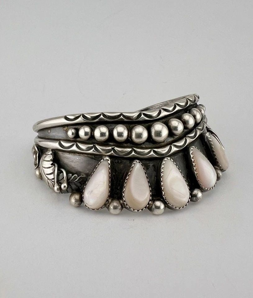 VTG RAYNA PLATERO SECATERO NAVAJO STERLING SILVER MOTHER OF PEARL CUFF BRACELET: Vtg Rayna Platero Secatero Navajo Sterling Silver Mother Of Pearl Cuff Bracelet Cuff is Just Over 5 1/2" tip to Tip and has a 1" Wide Adjustable Gap Cuff Is Just Under 1 1/4" Wide In the Center Weight