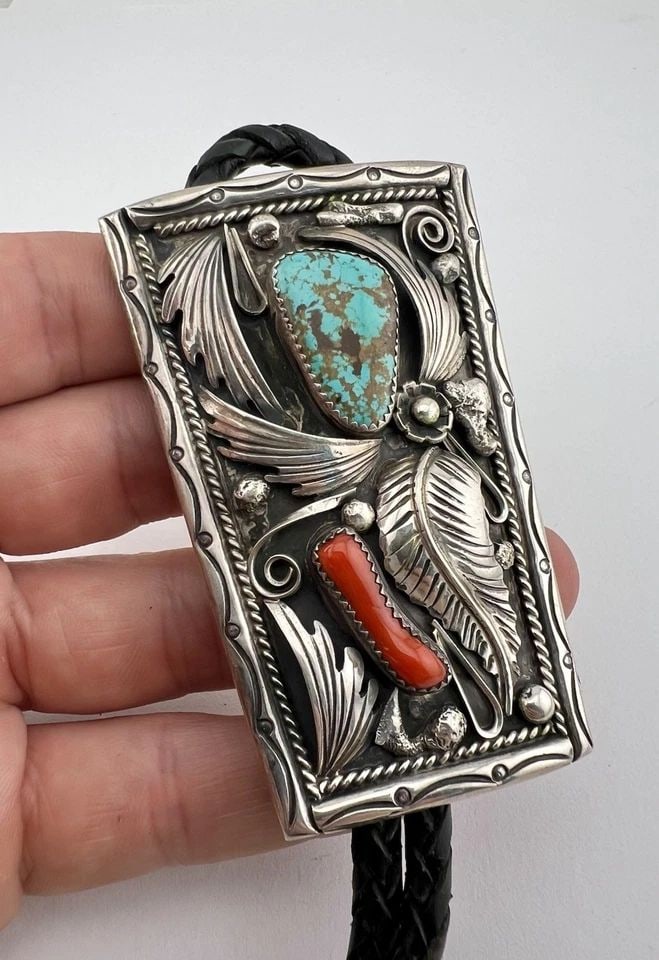 HUGE 3" VTG NAVAJO STERLING SILVER KINGMAN TURQUOISE & CORAL STAMPED BOLO TIE: HUGE 3" Vtg Navajo Sterling Silver Kingman Turquoise & Coral Stamped Bolo Tie Size: 3" Tall by 2" Wide At The Top Weight is 63.4 Grams on my scale Metal: Sterling Silver Amazing Natural Webbed Kingman